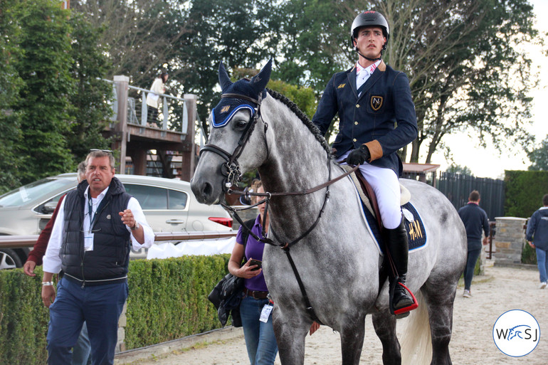 Ludo Philippaerts gives his son Nicola some last-minute advise. Photo (c) World of Showjumping.