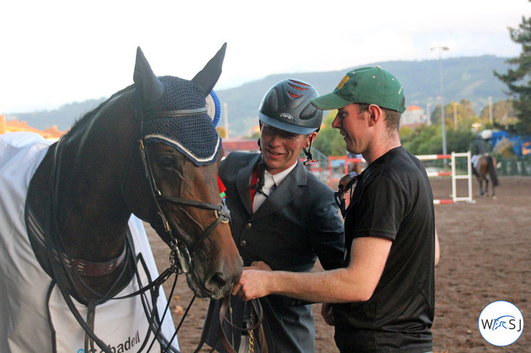 Dermott Lennon and his groom give Loughview Lou-Lou an admiring look after winning the CSIO5* Grand Prix in Gijon. Photo (c) World of Showjumping.