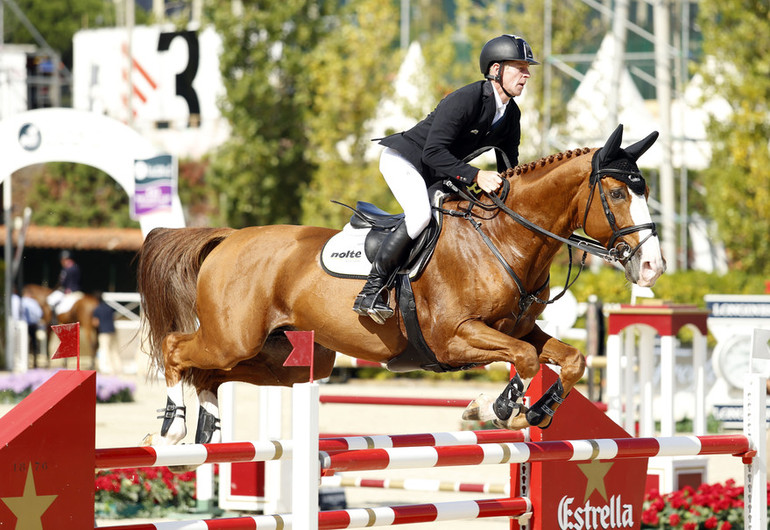 Marcus Ehning and Funky Fred on their way to victory in Barcelona. Photo (c) Tiffany Van Halle for World of Showjumping.