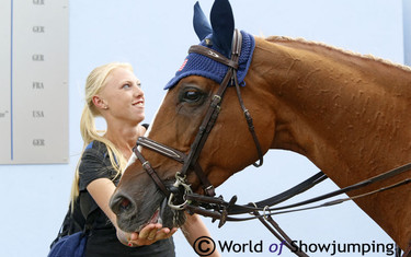 Barron gets a treat for a job well done. He ended 6th with USA's Lucy Davis.