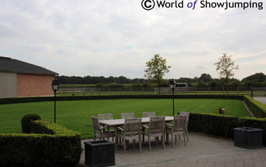 The beautiful outside area with views to some of the grass paddocks and the outdoor ring.