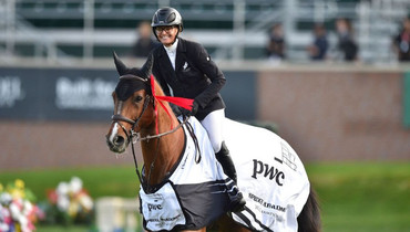 Erynn Ballard rides to the victory in the first Canadian win of the Spruce Meadows 2021 season