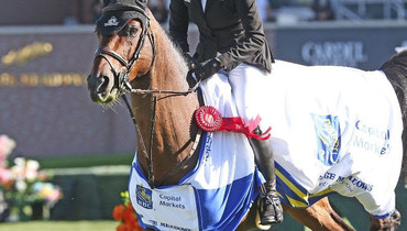 Tiffany Foster and Brighton take first place in the RBC Capital Markets Cup at Spruce Meadows 'National'