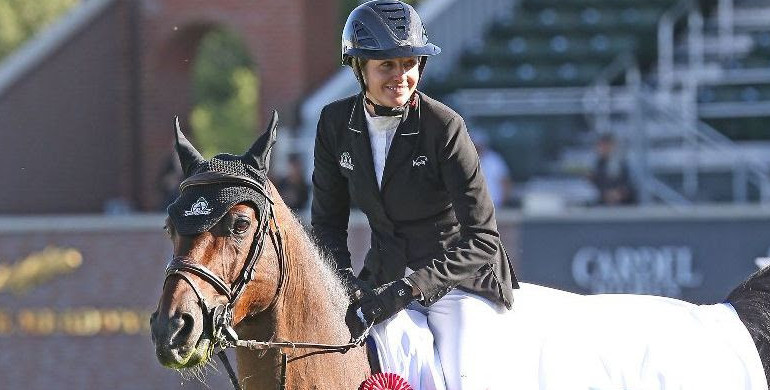 Tiffany Foster and Brighton take first place in the RBC Capital Markets Cup at Spruce Meadows 'National'