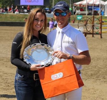 Jonathan McCrea accepts the Equis "Best Presented Horse" award from Alex West of Equis at HITS Saugerties. Photo by Jump Media.