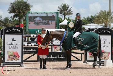 Tiffany Foster and Victor in their winning presentation with ringmaster Christian Craig. Photo (c) Sportfot. 