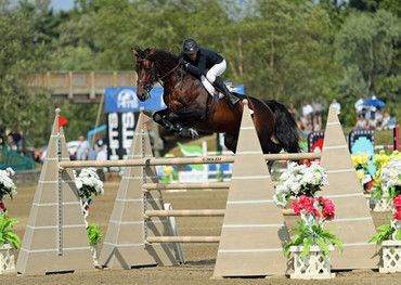 Lauren Tisbo and Coriandolo Di Ribano on their way to a $100,000 Hudson Valley Jumper Classic win. Photo (c) ESI Photography. 