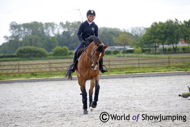 A happy Angelica doing what she loves at Ashford Farm.