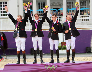 The British team won Olympic gold on home soil in London. Here are Nick Skelton, Ben Maher, Scott Brash and Peter Charles with their medals. Photo by © 2012 Ken Braddick/dressage-news.com.