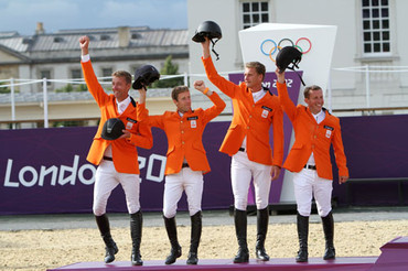 Jur Vrieling, Maikel van der Vleuten, Marc Houtzager and Gerco Schröder won the silver after a thrilling jump-off against Great Britain. Photo by © 2012 Ken Braddick/dressage-news.com.