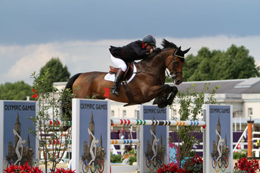 Peter Charles and Vindicat helped secure the gold for Britain in the jump-off. Photo by © 2012 Ken Braddick/dressage-news.com.