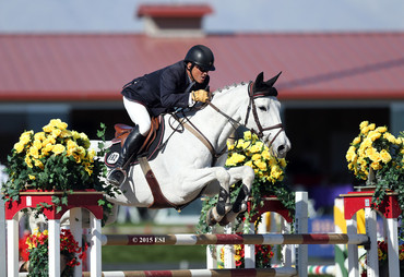. Will Simpson jumps clear to win his sixth Grand Prix victory at HITS Desert Horse Park on Katie Riddle, owned by Monarch International, in the $30,000 SmartPak Grand Prix Sunday, February 8, 2015. 