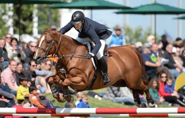 McLain Ward and Rothchild.  Photo © Spruce Meadows Media Services.