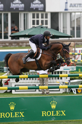 Kent Farrington and Voyeur en route to victory at Spruce Meadows.