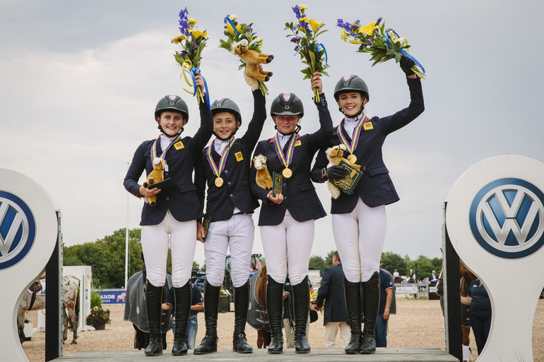 The winning British team: Charlotte Ash, Jodie Hall Mcateer, Jack Whitaker and Jessica Hewitt. Photo (c) Lotta Pictures/FEI.