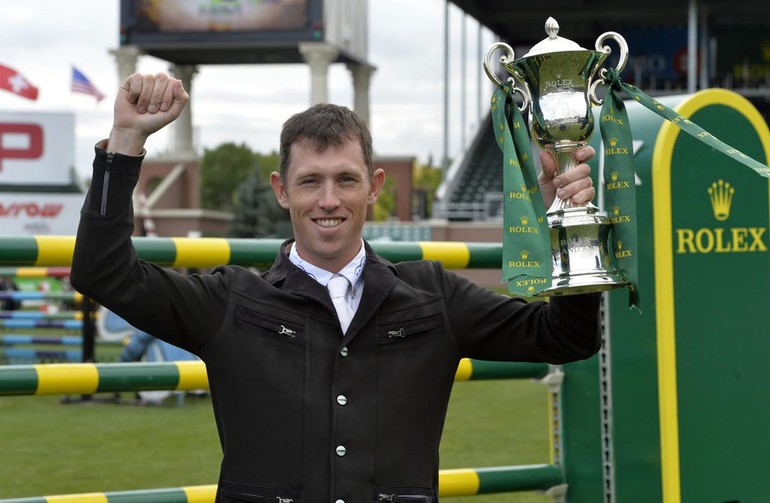 Brash, the first rider ever to win the Rolex Grand Slam of Show Jumping, with the Rolex Grand Slam Trophy. Photo (c) Rolex Grand Slam of Show Jumping/Kit Houghton.