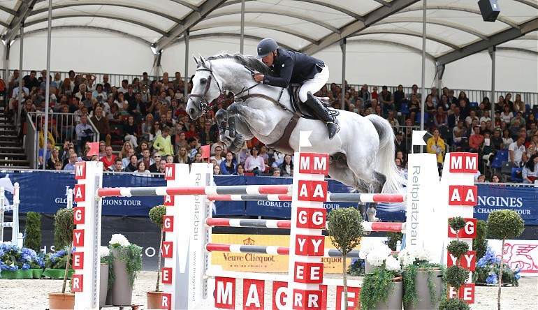 Roger-Yves Bost and Pegase du Murier en route to victory in Vienna. Photo (c) Stefano Grasso/LGCT.