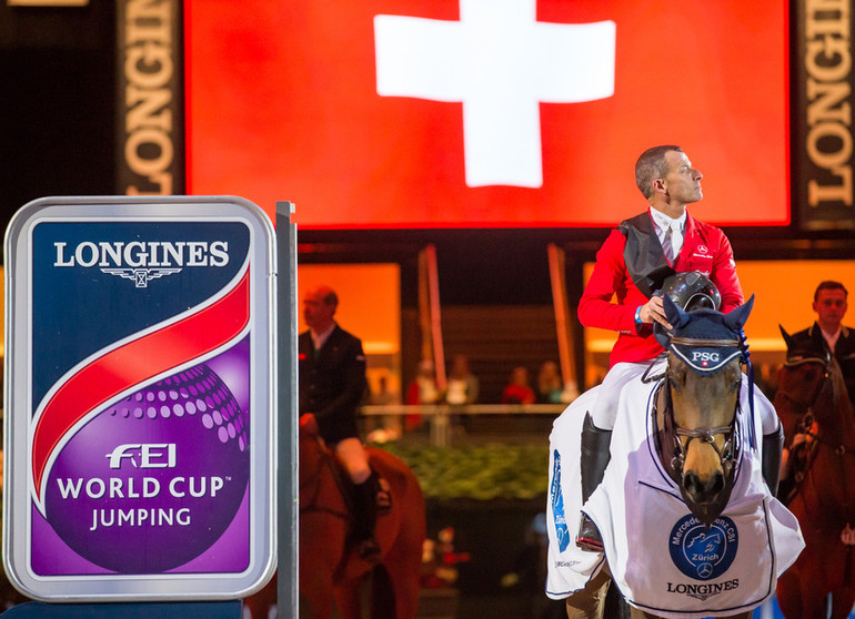 Pius Schwizer enjoys the Swiss national anthem after winning the Longines FEI World Cup in Zürich. All photos (c) Tomas Holcbecher.