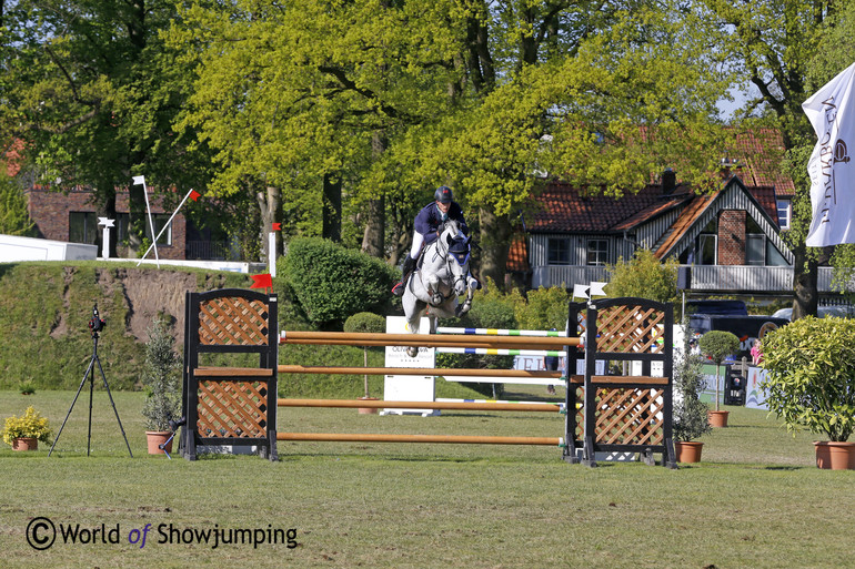 Nicola Philippaerts and Zilverstar T flying over the last fence.