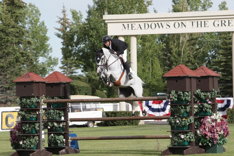 Eric Lamaze aboard Check Piccobello in the Huskey Energy Cup. Photo (c) Spruce Meadows Media Services.