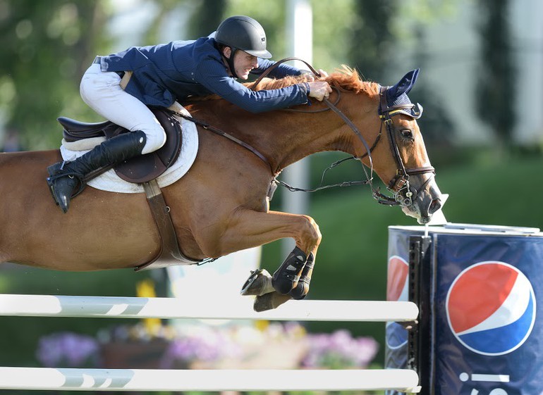 Daniel Coyle aboard Somerset in the Pepsi U25 Cup. Photo (c) Spruce Meadows Media Services.