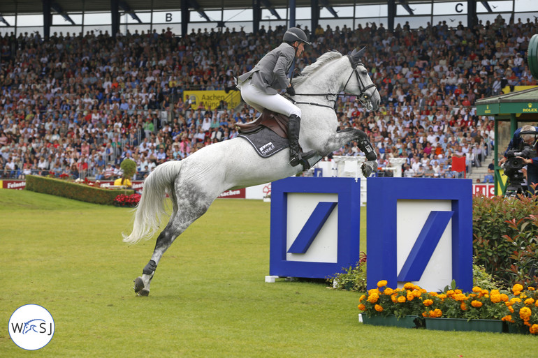 The distance between fence 4 and 5 got all wrong for Ludger Beerbaum and Chiara, with no chance to clear the water.  After Chiara placed all four legs in the water, Ludger decided to retire. 