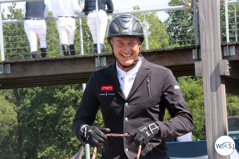 A big smile from Marc Houtzager. Photo (c) World of Showjumping.