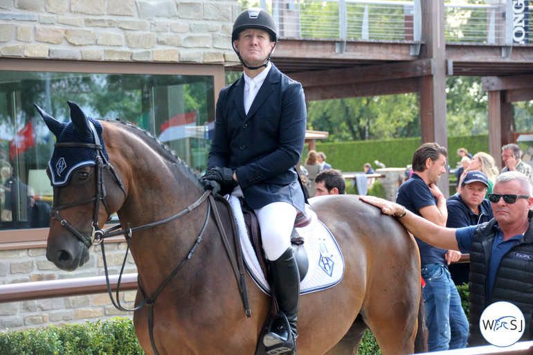 A focused McLain Ward and the super cute HH Carlos Z. Photo (c) World of Showjumping.