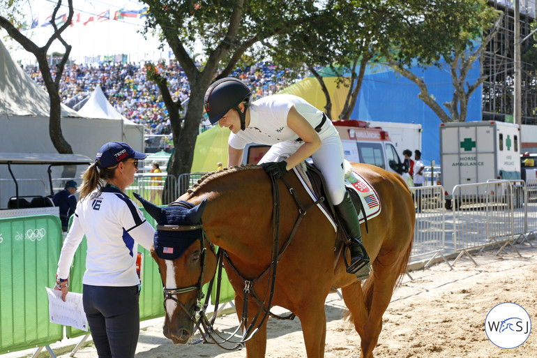 Lucy Davis being congratulated by Laura Kraut after a great clear round. 