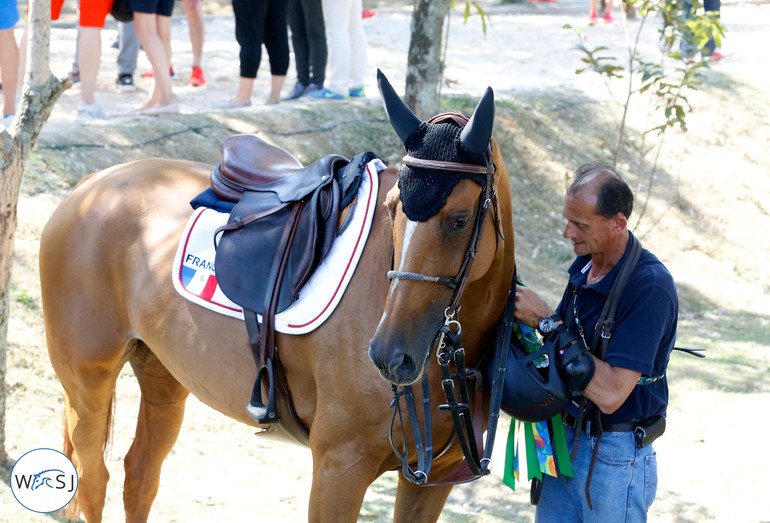 Claude makes Sydney Une Prince ready for the prize giving.