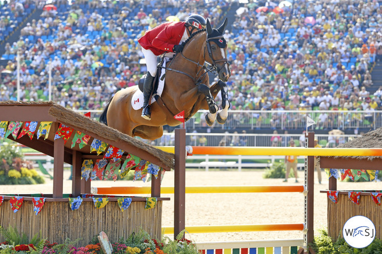 The bronze medal went to Eric Lamaze (CAN) and Fine Lady 5.