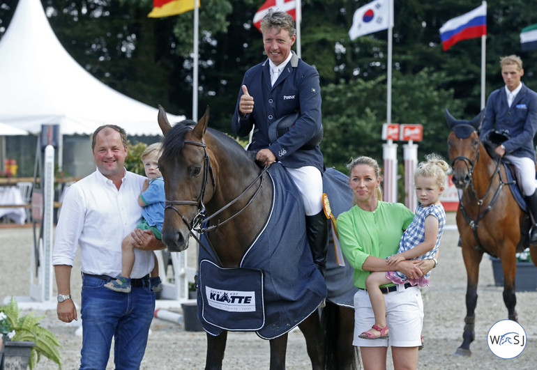 Markus Beerbaum won the Grand Prix in Klein Roscharden riding Tequila de Lile - here replaced by Athena for the price giving. Photo (c) Jenny Abrahamsson.