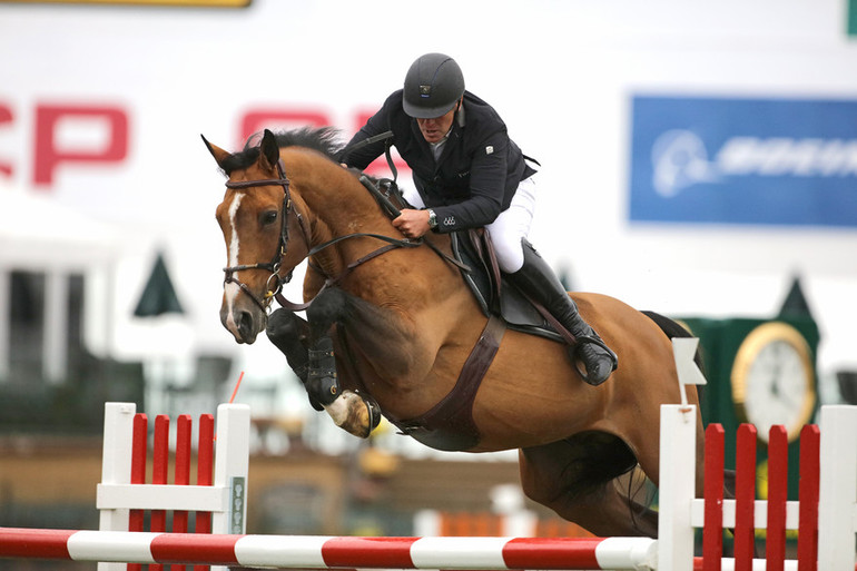 Roger-Yves Bost (FRA) aboard Quod'Coeur de la Loge in the CANA Cup. Photo (c) Spruce Meadows Media Services.