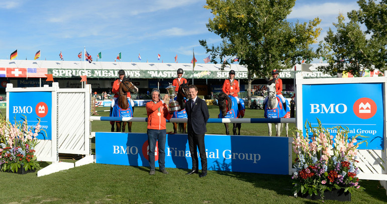 Frank Techar, COO, BMO Financial Group presents the 2016 BMO Nations' Cup to Team Switzerland. Photo (c) Spruce Meadows Media Services.