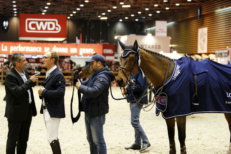 Tobias Meyer being interviewed after winning the Longines Grand Prix of Lyon. Photo (c) Tiffany Van Halle for World of Showjumping.