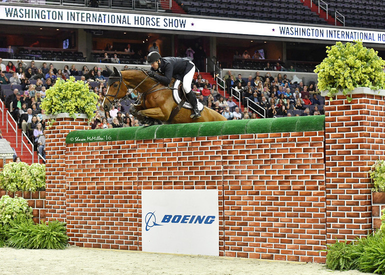 McLain Ward and ZZ Top v/h Schaarbroek Z clear 7 feet in the Puissance. Photo (c) Shawn McMillen Photography. 