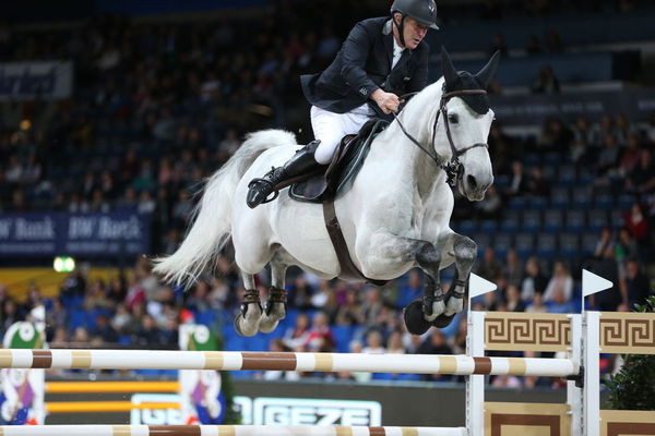 Roger Yves Bost en route to victory on Pegase du Murier in Stuttgart. Photo (c) Stuttgart German Masters.