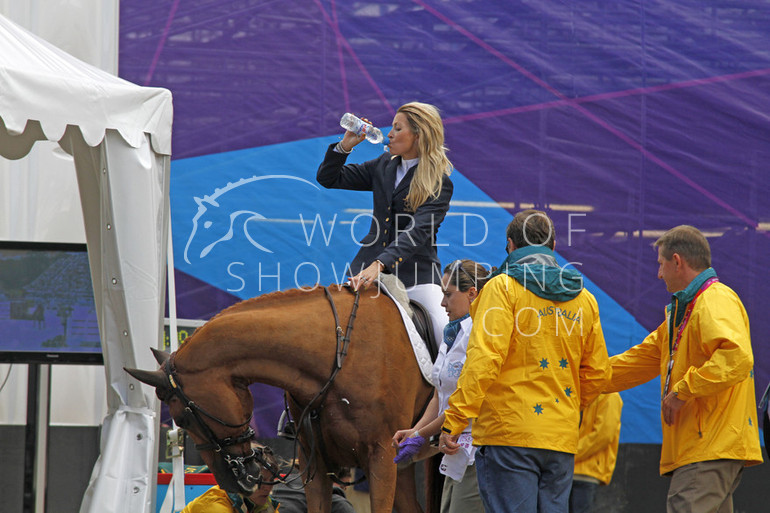Edwina Tops-Alexander took a water break while the vets checked Itot du Chateau. 