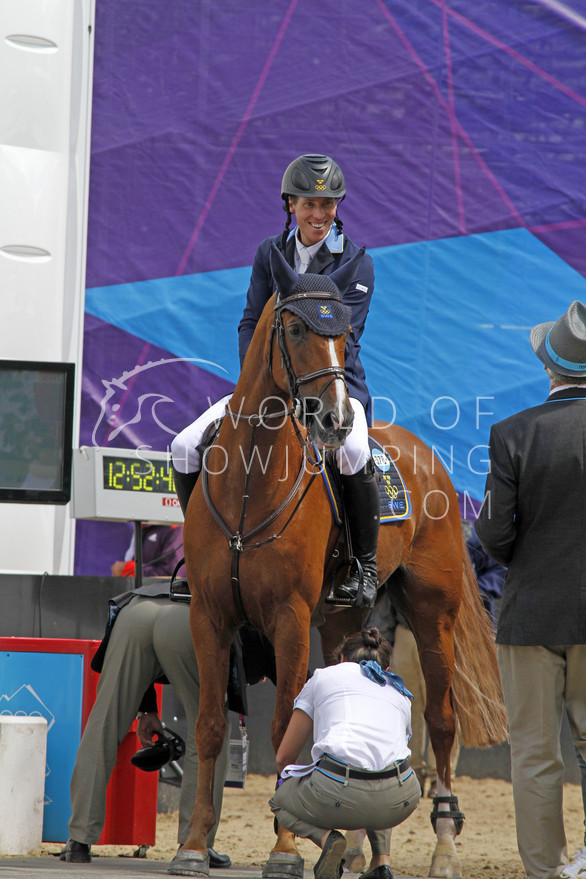 Another rider with a big smile after his ride - Henrik von Eckermann with Allerdings. Every horse gets checked by the vets after their round, the boots are taken off and the legs are checked.