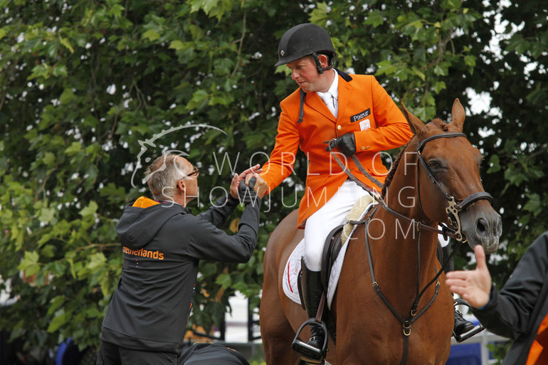 Rob Enhrens, Gerco Schröder and London celebrate silver in London.