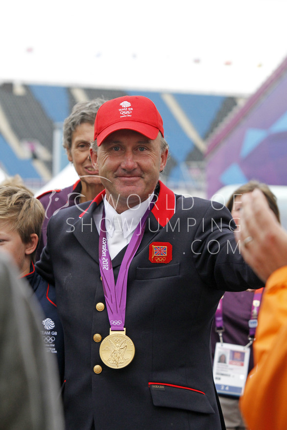 A moved Peter Charles with his gold medal.
