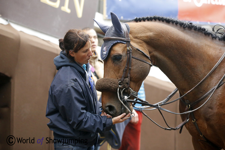 Christina Liebherr's L.B. Eagle Eye is getting a well deserved treat after the second round. 