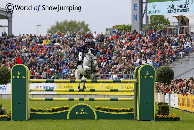 Daniel Deusser and Cornet d'Amour over the last fence in the jump-off. Photo (c) Jenny Abrahamsson. 