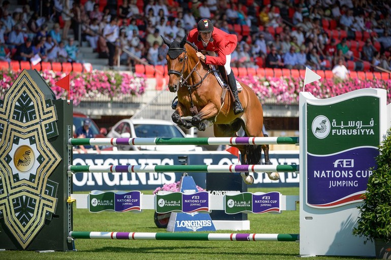 Jos Verlooy riding Domino to a double clear round for Belgium. Photo Photo (c) Katja Stuppia/FEI.