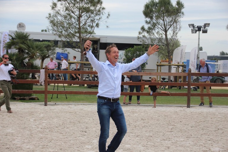 Rik Hemeryck was a happy man in Knokke; first he won the CSI2* Grand Prix - then his former ride Papillon Z went to the top in the CSI5* Grand Prix. Here he is on his way to congratulate Jerome Huery. Photo (c) World of Showjumping.