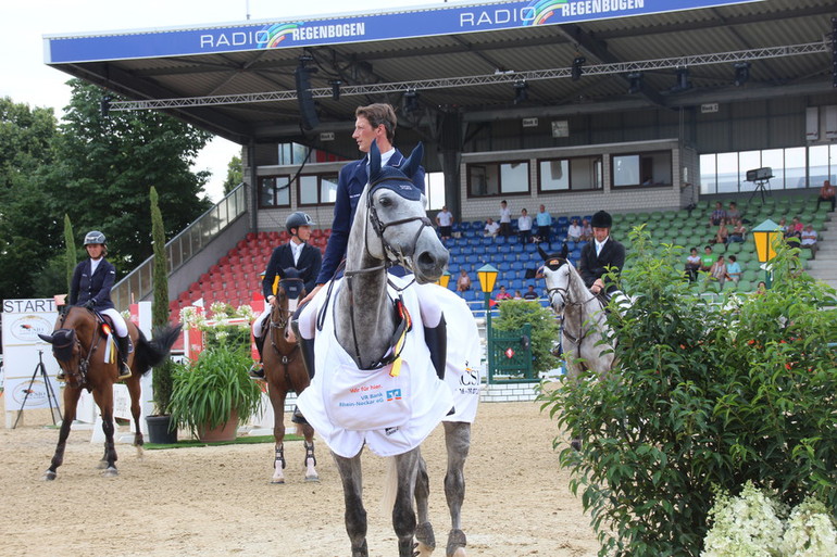 Daniel Deusser and Comtesse vt Ertsenhof Z won the youngster tour final in Mannheim. Photo (c) World of Showjumping.