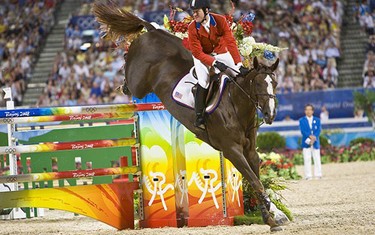 Sapphire and McLain Ward. Photo (c) Ken Braddick/dressage-news.com.