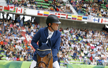 Norway's Geir Gulliksen takes a look at his time after going clear on Edesa S Banjan.