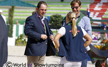 Cian O'Connor came to help Austria's Stefanie Bistan.