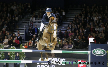 While Tinka's Serenade knocked the second vertical and the front pole down on the oxer.